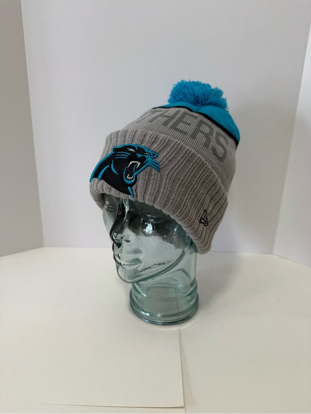 New Era Carolina Panthers NFL Gray and Teal Pom Beanie